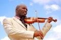 Businessman with violin Royalty Free Stock Photo
