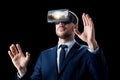 Businessman in virtual reality glasses or headset Royalty Free Stock Photo