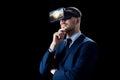 Businessman in virtual reality glasses or headset Royalty Free Stock Photo