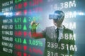 The businessman in virtual reality trading on stock market