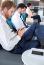 Businessman wait airplane in waiting room Royalty Free Stock Photo