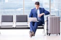 Businessman waiting at the airport for his plane in business cla Royalty Free Stock Photo