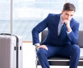 Businessman waiting at the airport for his plane in business cla Royalty Free Stock Photo