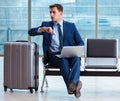 Businessman waiting at the airport for his plane in business cla Royalty Free Stock Photo