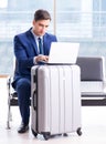 Businessman waiting at the airport for his plane in business cla Royalty Free Stock Photo