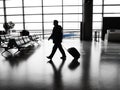 Businessman walking in airport Royalty Free Stock Photo