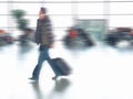 Businessman walking in airport Royalty Free Stock Photo