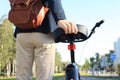 Businessman walking with bike in street after work. Royalty Free Stock Photo