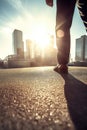 Businessman walking in City street with sunlight flare for successful confidence concept,