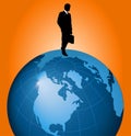 Businessman walking on globe