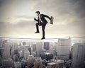 Businessman walking on a rope Royalty Free Stock Photo