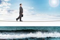 Businessman walking rope Royalty Free Stock Photo