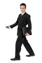 Businessman walking sideways Royalty Free Stock Photo