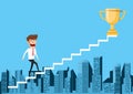 Businessman walking on stair step to trophy and success. Staircase to success. Royalty Free Stock Photo