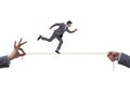 Businessman walking on tight rope Royalty Free Stock Photo