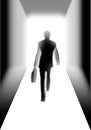 Businessman walking to the light