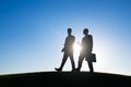 Businessman walking together conversation talking Royalty Free Stock Photo