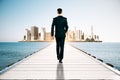 Businessman walking towards city Royalty Free Stock Photo