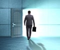 Businessman walking towards open door Royalty Free Stock Photo