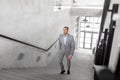 Businessman walking upstairs Royalty Free Stock Photo