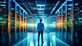 Businessman walks through data center corridor, visually inspecting working server racks