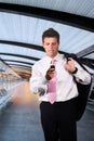 Businessman walks on a modern corridor Royalty Free Stock Photo