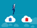 Businessman walks from old cloud to new cloud. Changing business