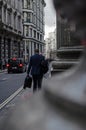 Businessman walks on the street