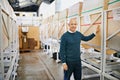 Businessman, warehouse and portrait of industrial factory with inventory, product and cargo. Manager, investor or Royalty Free Stock Photo