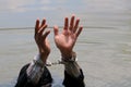Businessman was arrested by handcuffs and drowning
