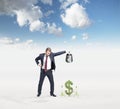 Businessman watering money, growth Royalty Free Stock Photo