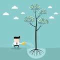 Businessman watering money tree Business success