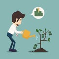 Businessman watering a plant of money Royalty Free Stock Photo