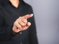 Businessman wearing a black shirt is pointing to touching the virtual screen. Royalty Free Stock Photo