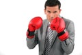 Businessman wearing boxing gloves Royalty Free Stock Photo