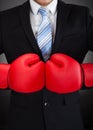 Businessman Wearing Boxing Gloves Royalty Free Stock Photo