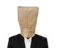 Businessman wearing brown paper bag, with copy space, isolated on white background Royalty Free Stock Photo