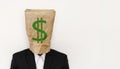 Businessman wearing crumpled brown paper bag, with green dollar sign, business bankruptcy concept, with copy space Royalty Free Stock Photo