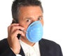 Businessman wearing a flu mask Royalty Free Stock Photo