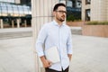 Businessman wearing glasses holding tablet Royalty Free Stock Photo