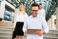 Businessman wearing glasses holding tablet Royalty Free Stock Photo