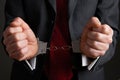 Businessman Wearing Handcuffs Illustrating Corporate Crime Royalty Free Stock Photo