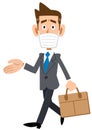 Businessman wearing a mask and commuting to work