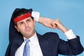 Businessman wearing a sweatband Royalty Free Stock Photo