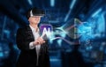 Businessman wearing virtual reality headset interacting with AI data analytics interface in futuristic digital Royalty Free Stock Photo