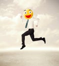 Businessman wears yellow smiley face