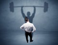 Businessman with weight lifting shadow Royalty Free Stock Photo