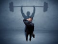 Businessman with weight lifting shadow Royalty Free Stock Photo