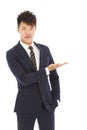 Businessman with welcome and showing gesture Royalty Free Stock Photo