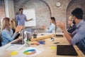 Businessman At Whiteboard Giving Presentation Royalty Free Stock Photo